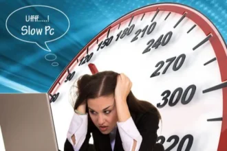 A person looking frustrated while using a slow computer, illustrating the need to fix performance issues