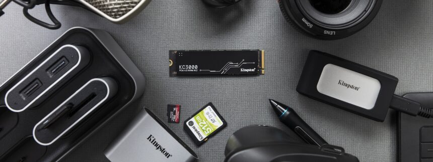 An internal NVMe SSD being installed into the motherboard of a computer, highlighting the process of a storage upgrade.