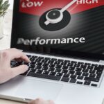 A professional working productively on a fast laptop in a bright, modern office, illustrating the positive results of improved computer performance